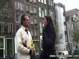 With his guide horny tourist visits a prostitute in Amsterdam