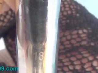 Female Masturbate Her Pee Hole with a Huge Dildo of...