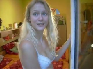 Beautiful little blonde swallowing cum